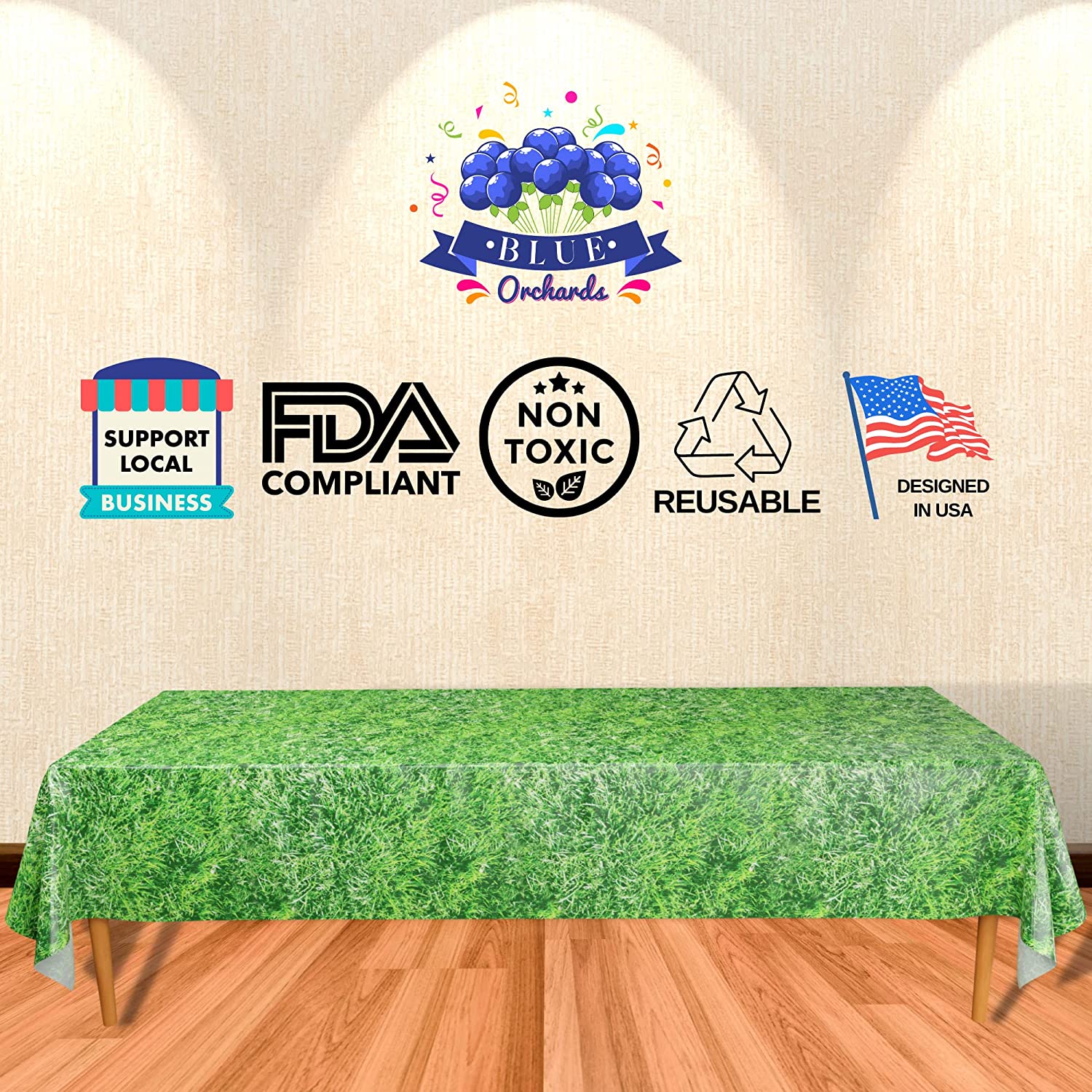 Image of the Grass Table Covers, a pack of two measuring 54"x108". These table covers are perfect for a variety of nature-themed parties, including jungle parties, woodland birthdays, and safari-themed events. They feature a realistic grass design and are FDA compliant, non-toxic, and reusable. Designed in the USA, these table covers are plastic and perfect choice for your party decor.