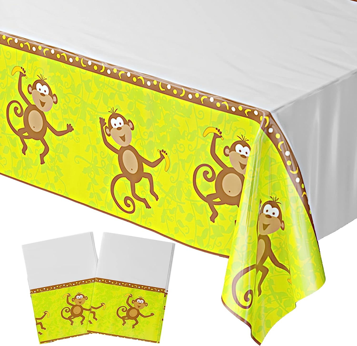 Image of a pack of two Monkey Party Table Covers measuring 54"x108" each, featuring a cute monkey design. These table covers are perfect for monkey-themed parties, jungle baby showers, or any other festive occasion. The covers are displayed on a plain background.