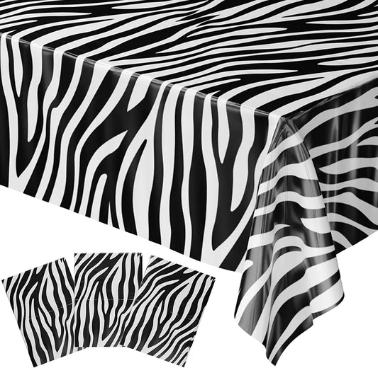 The Zebra Table Covers come in a pack of 3 and each measures 54"x108". The table covers feature a striking black and white zebra print design, resembling the pattern of a zebra's stripes. The material of the table covers is durable and easy to clean, making it perfect for both indoor and outdoor events. With these table covers, you can add a fun and unique touch to your table setting, perfect for any occasion or theme party.