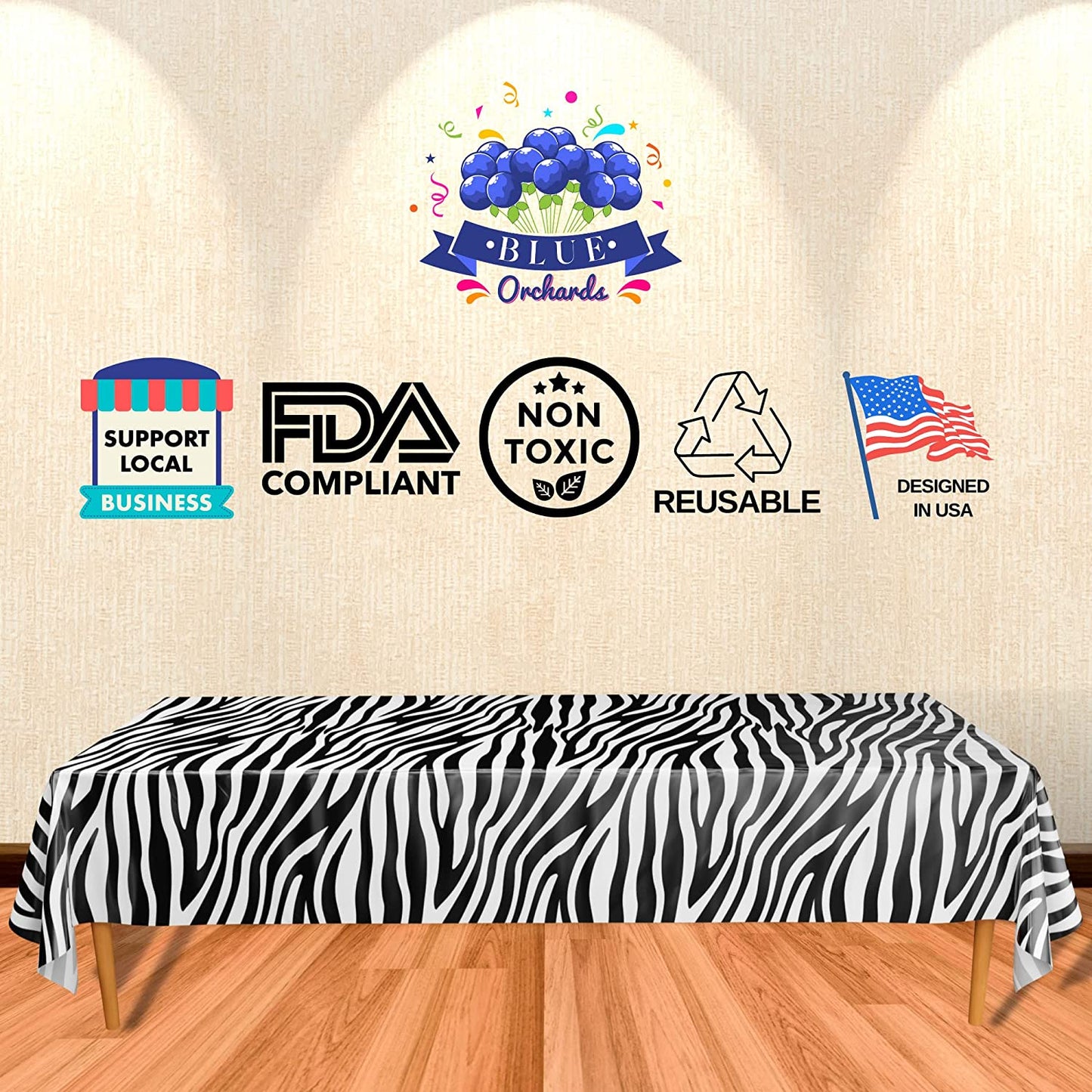An FDA compliant, non toxic, reusable and designed in USA table covers feature a striking black and white zebra print design, resembling the pattern of a zebra's stripes.