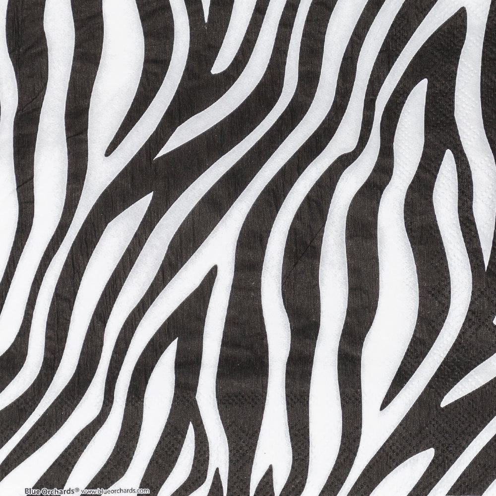 Zebra Stripe Paper Lunch Napkins with bold black and white pattern, ideal for adding a touch of safari-inspired flair to your table decor and cleaning up in style.